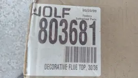 803861 WOLF Flue Top Steel Box Dinged
