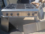 36inch Dcs Grill 4 Burner Stainless Steel Gas Range Top And G.e. Exhaust Hood. Fixed Price $1500.00.